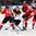 MINSK, BELARUS - MAY 14: Germany's Leon Draisaitil #71 attempts to slip past Switzerland's Andres Ambuhl #10 and Roman Josi #90 while Dominik Schlumpf #27 looks on during preliminary round action at the 2014 IIHF Ice Hockey World Championship. (Photo by Andre Ringuette/HHOF-IIHF Images)

